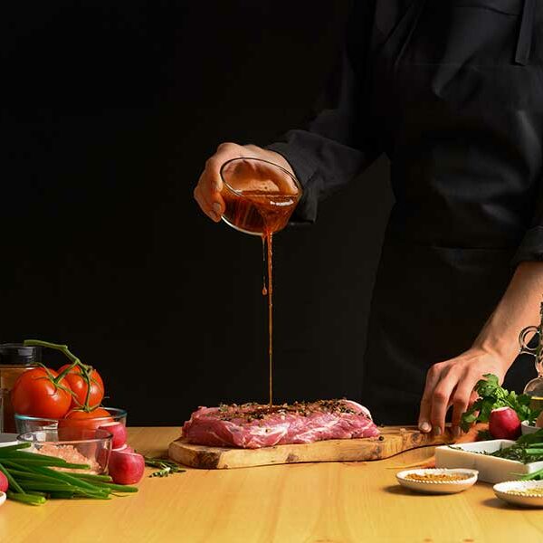 chef cooks pork steak